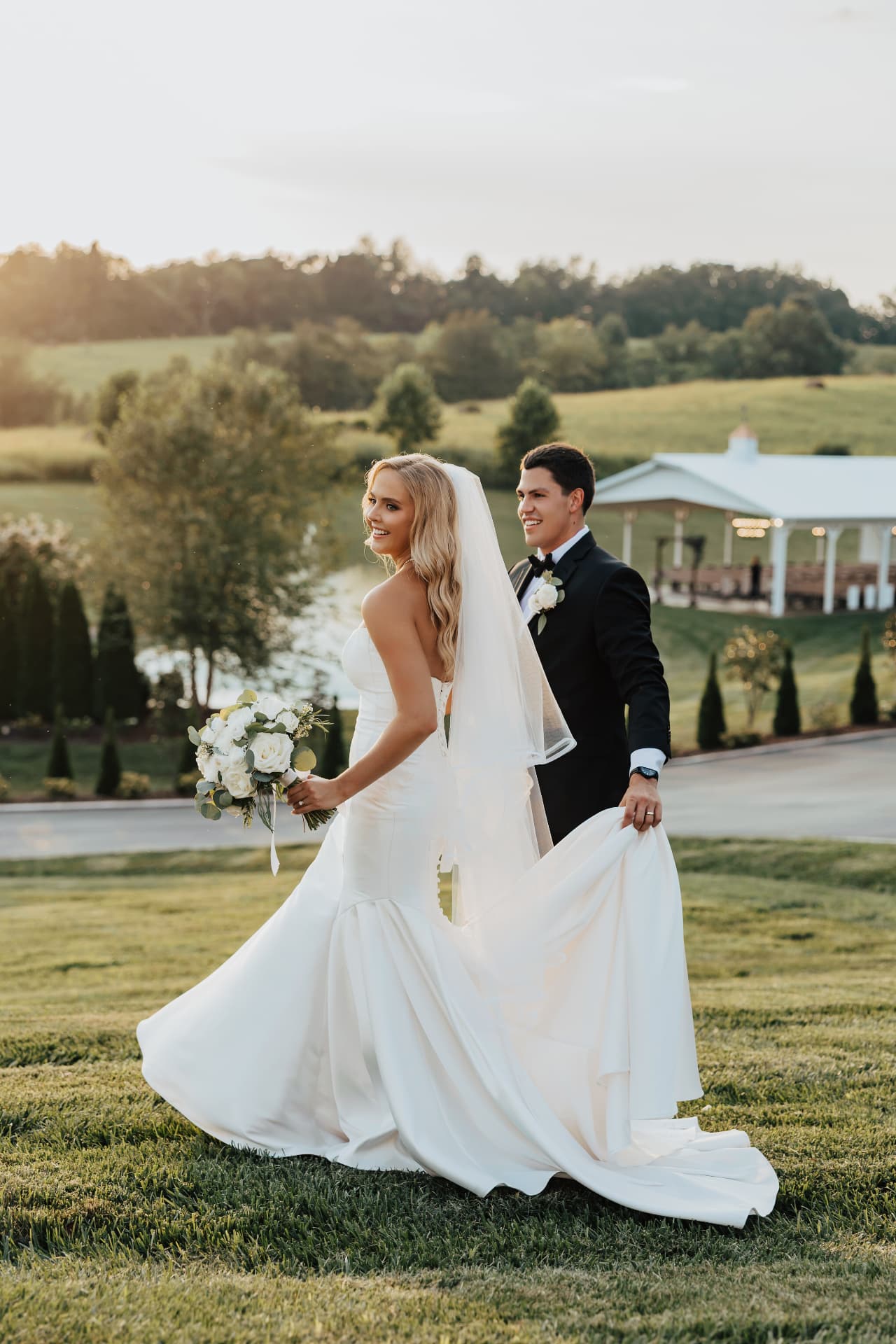 The Hunters Co walking across an estate lawn at golden hour